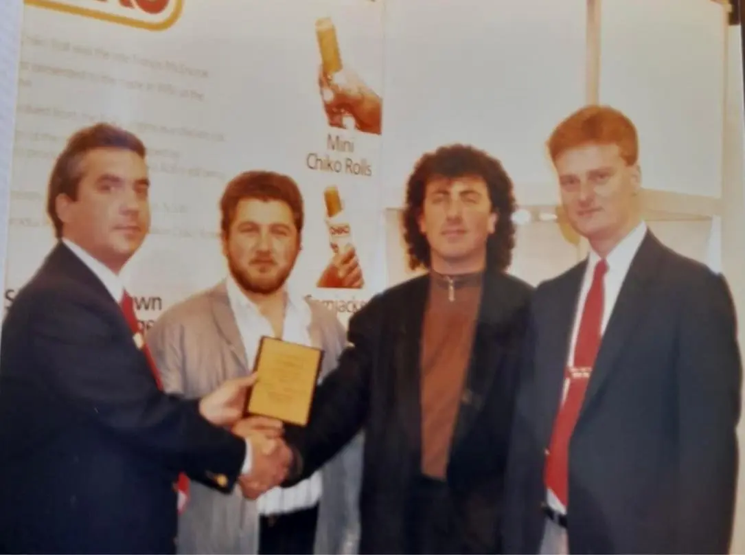 Receiving an industry award for excellence in food distribution