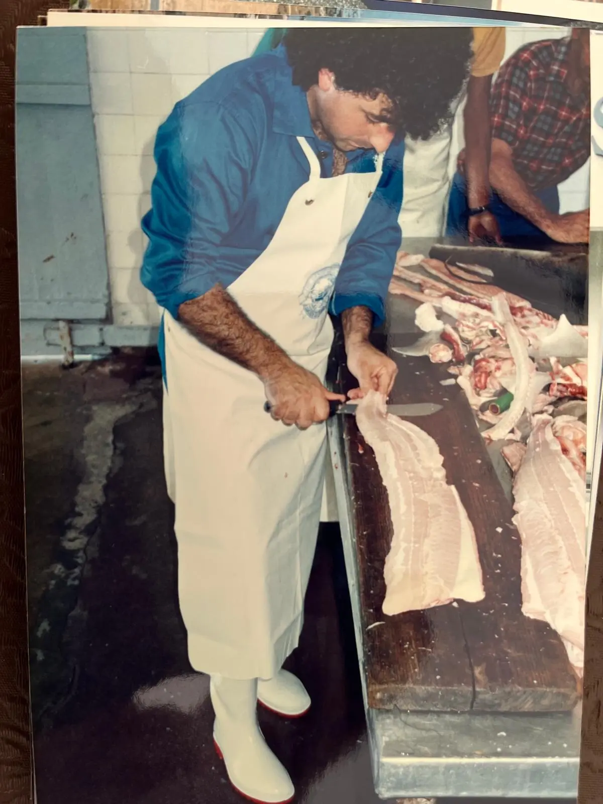 Prof. Greg Stamboulidis filleting fresh shark in the early days