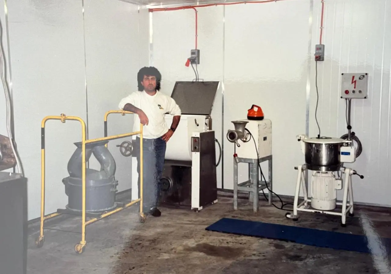 Greg Stamboulidis with early processing machinery