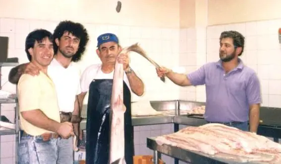Greg & Haris Stamboulidis & Nick Athanosopoulos filleting fresh fish